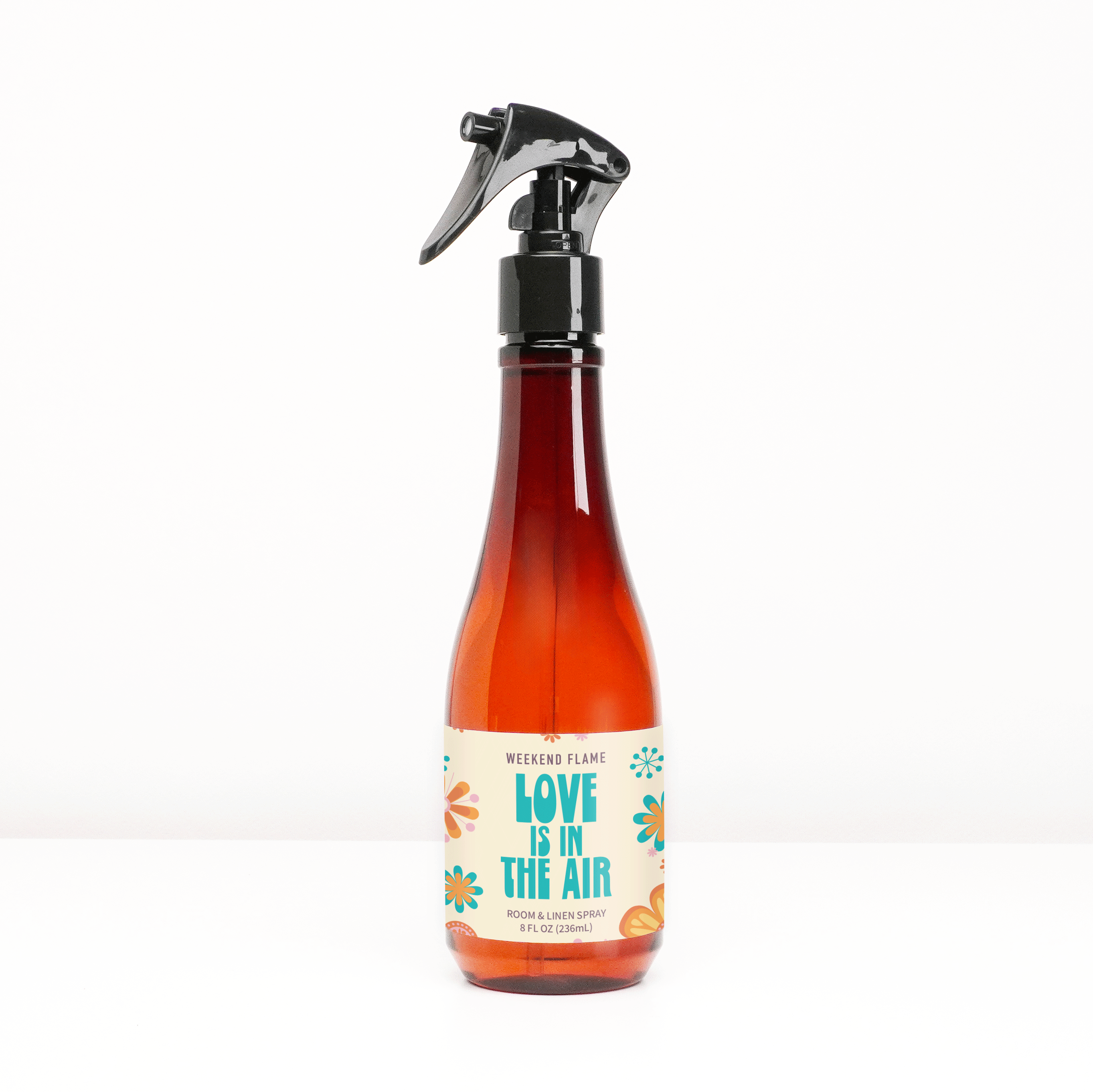 Love is in the air valentines day room and linen spray in amber bottle with black  trigger sprayer