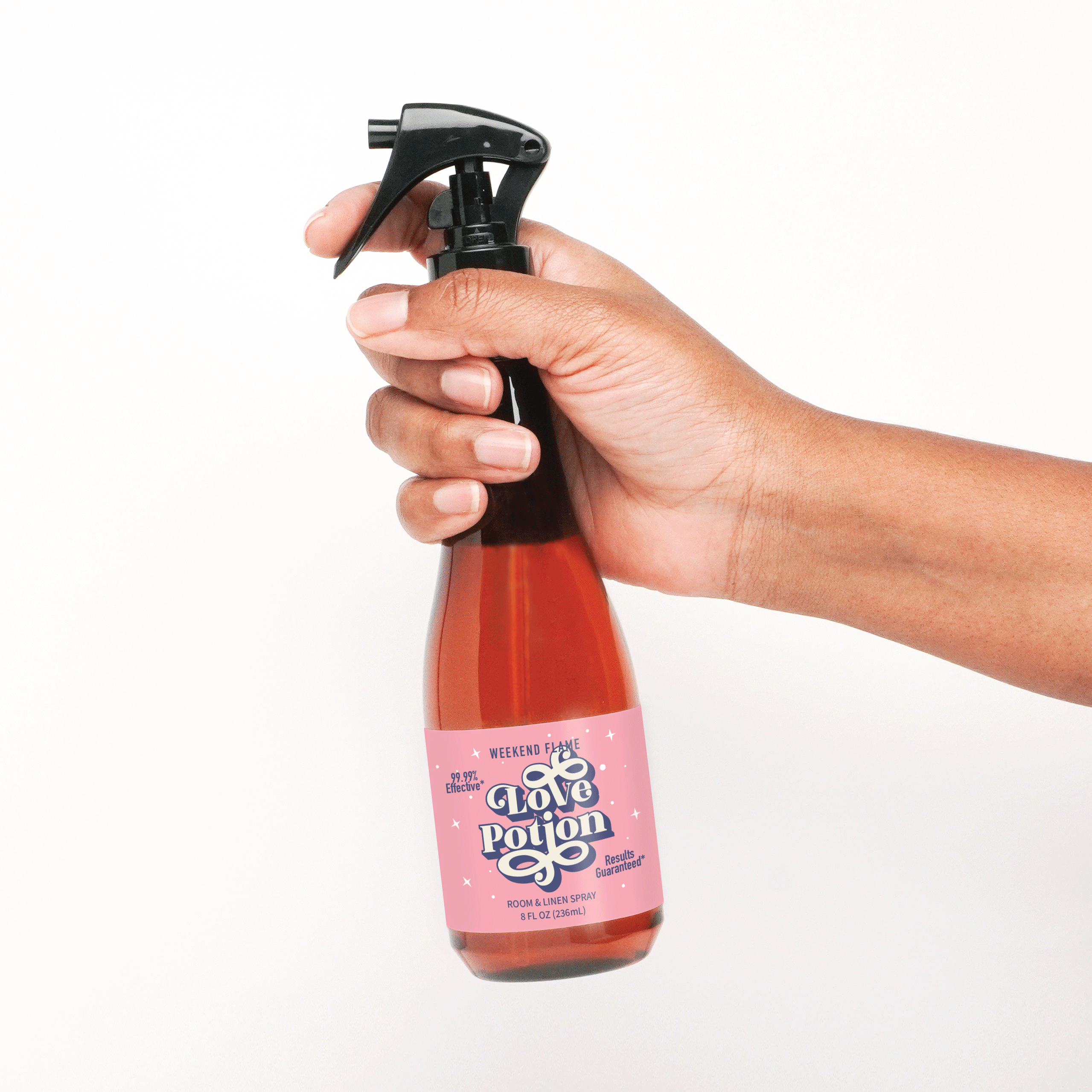 Valentines Day gift room and linen spray with pink retro label that reads Love Potion