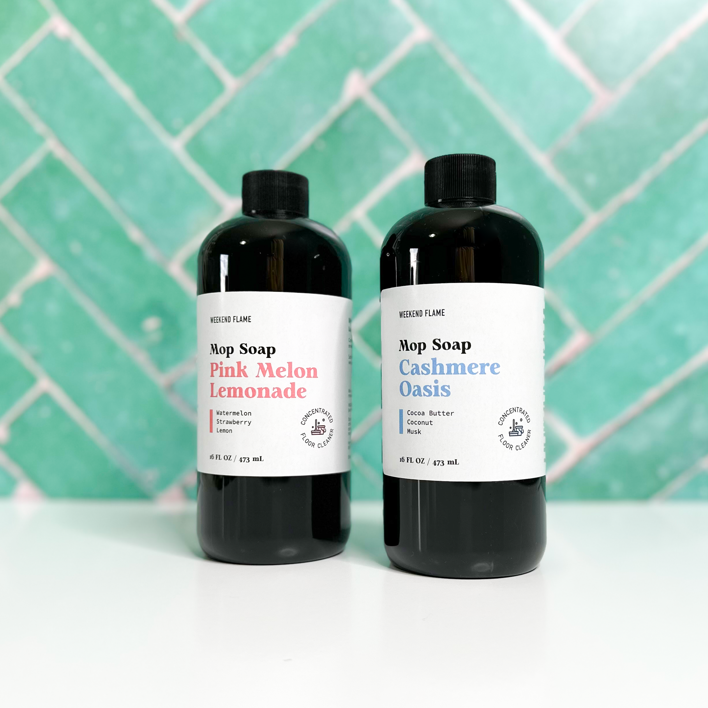 Assorted scented mop soap bottles arranged side by side. Scented mop soap in 16 oz bottles for floor cleaning