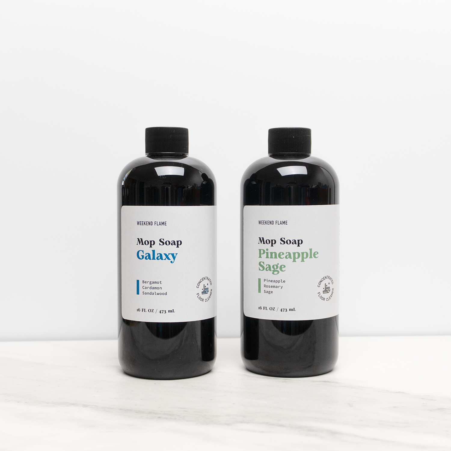 Two bottles of Mop Soap with labels on a white background