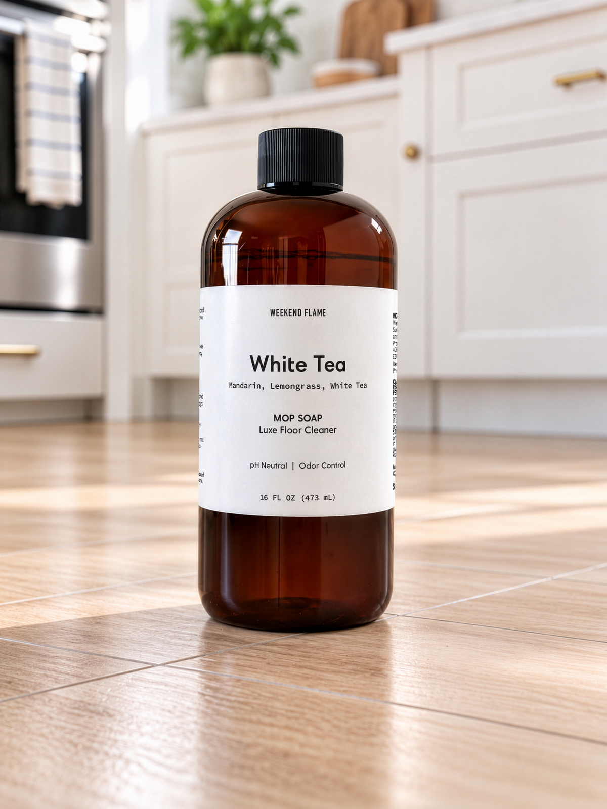white tea scented mop soap on kitchen floor.