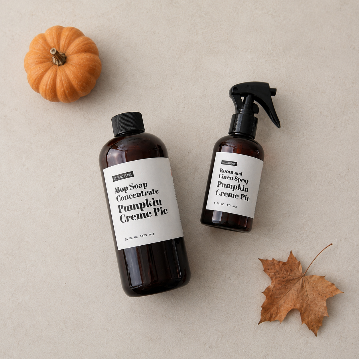 Pumpkin Creme Pie Mop Soap Concentrate and Room and Linen Spray collection styled with white pumpkins and subtle fall decor.