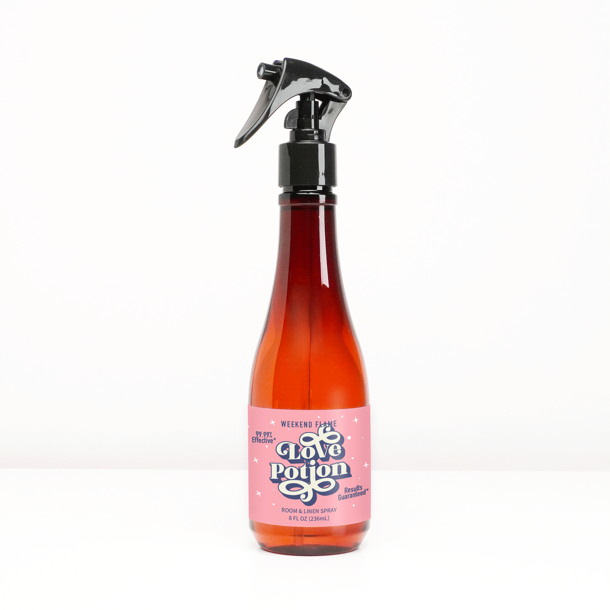 Valentines Day themed room and linen spray with pink retro label that reads Love Potion